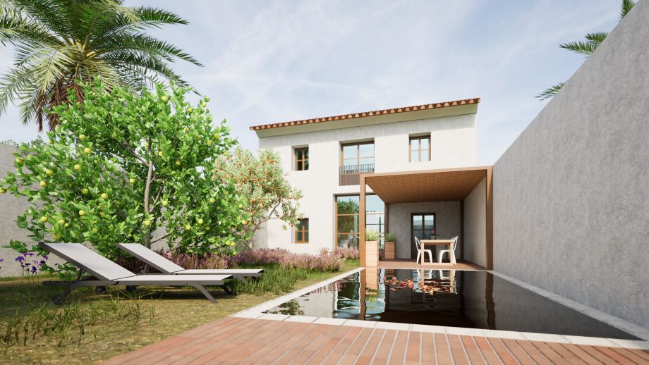 Vista del patio interior y piscina desde el salón de bajo industrial reformado en vivienda pasiva en valencia